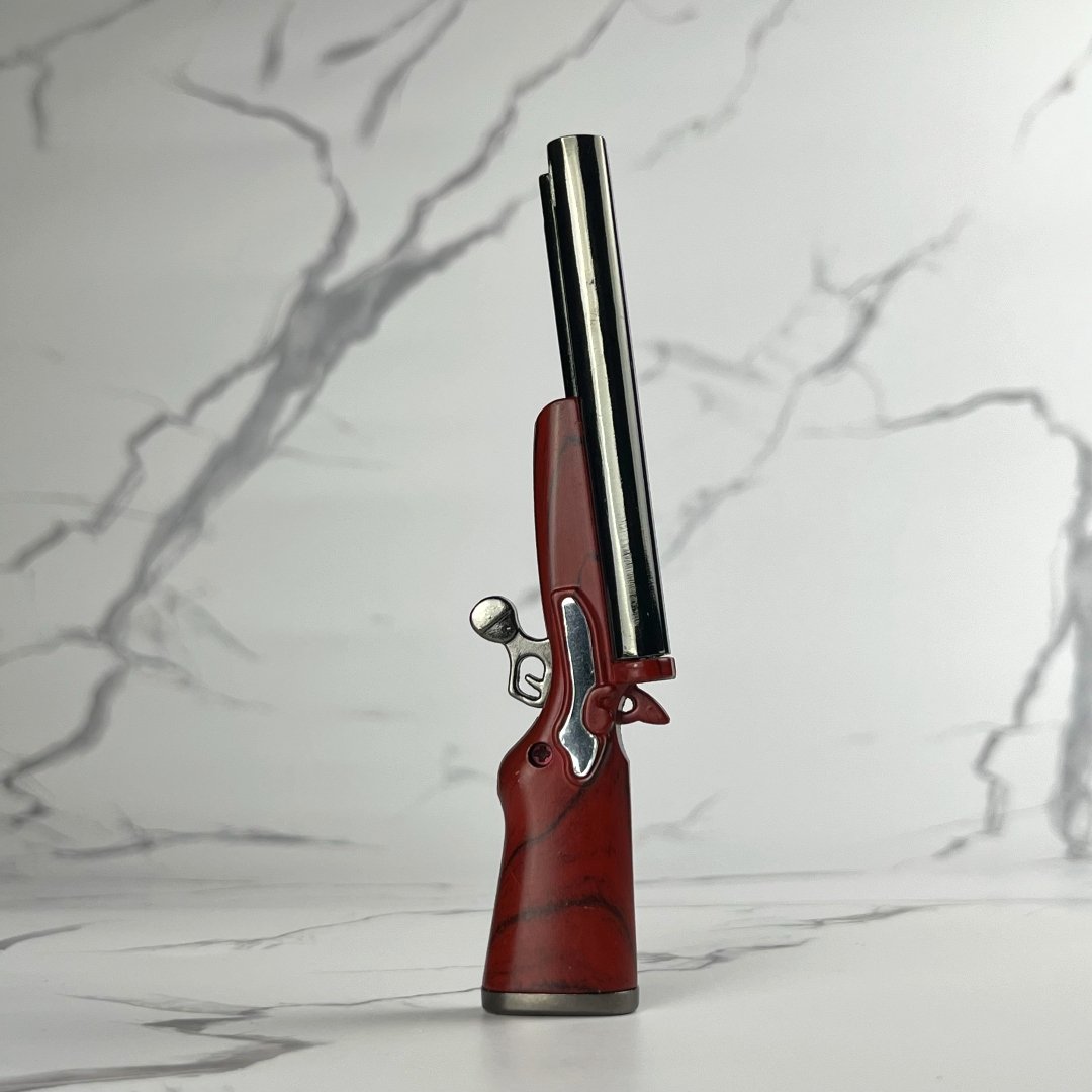 Double Barrel Shotgun Lighter – refillable butane lighter modeled after a shotgun with dual soft flames and trigger ignition