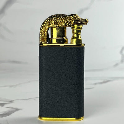 Gold Crocodile Beast Flame Lighter – refillable butane torch lighter with black and gold crocodile head design, displayed upright
