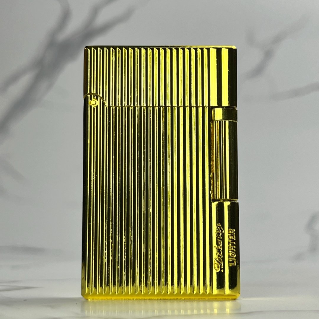 Side Strike Lighter – gold refillable butane lighter with side ignition wheel, sleek metallic finish, and modern design