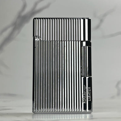 Side Strike Lighter – silver refillable butane lighter featuring smooth side ignition wheel and elegant reflective finish