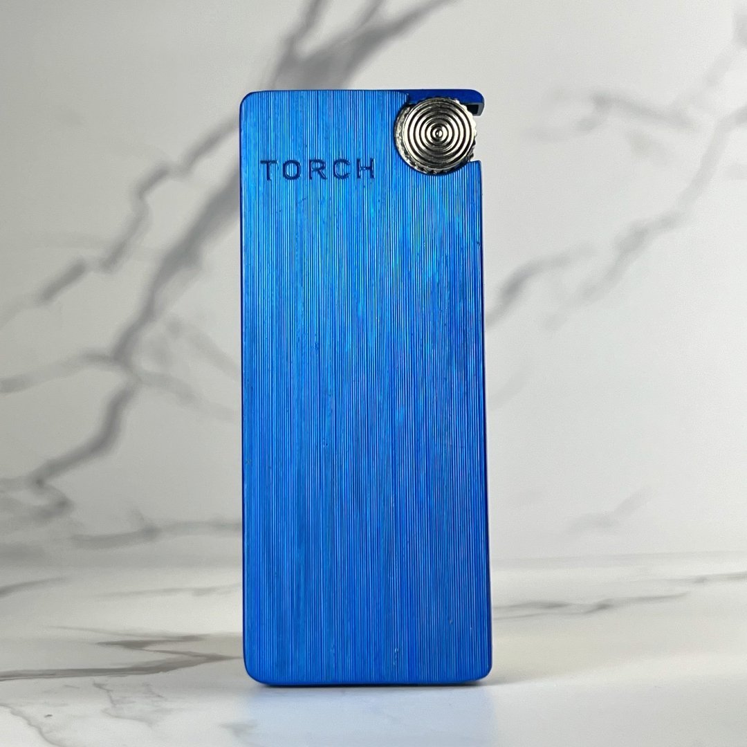 Slim Torch Lighter – blue refillable butane pocket lighter featuring sleek design and clean jet torch flame