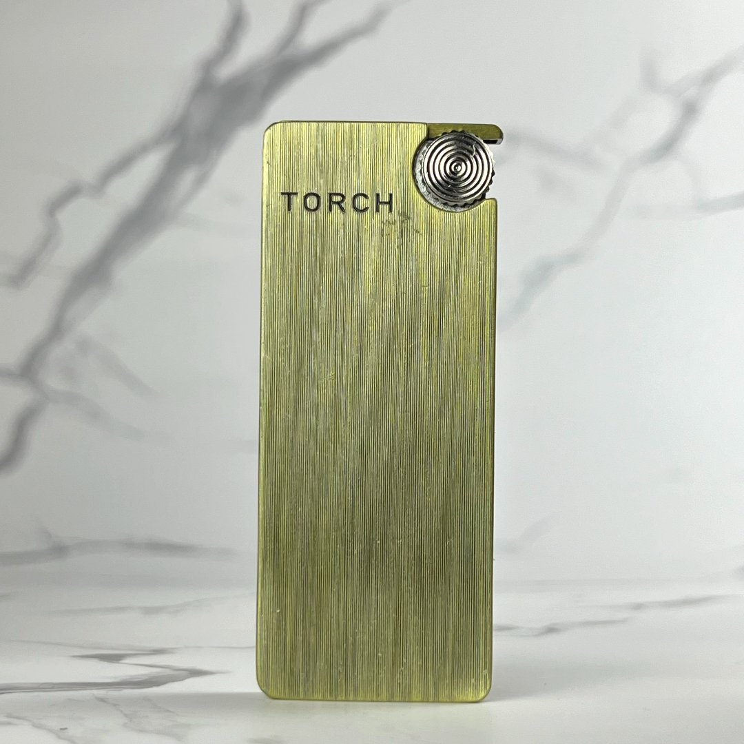 Slim Torch Lighter – gold refillable butane lighter with modern metallic finish, flip cover, and jet torch flame ignition